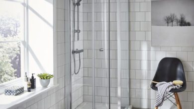 Photo of 700 x 760 corner entry shower enclosure creates elegance in the bathroom